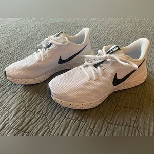 White Nike Revolution Sneakers